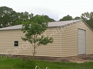 Vertical Roof Style Fully Enclosed Triple Wide Garage with Garage Door